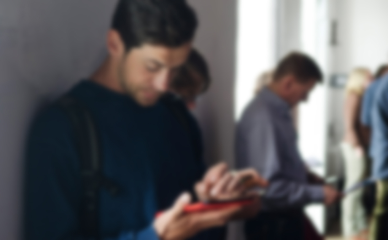 Blurry man with phone